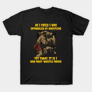 As I child I was enthralled by wrestling, yet today, it is I, who must ‘Wrestle mania’ T-Shirt